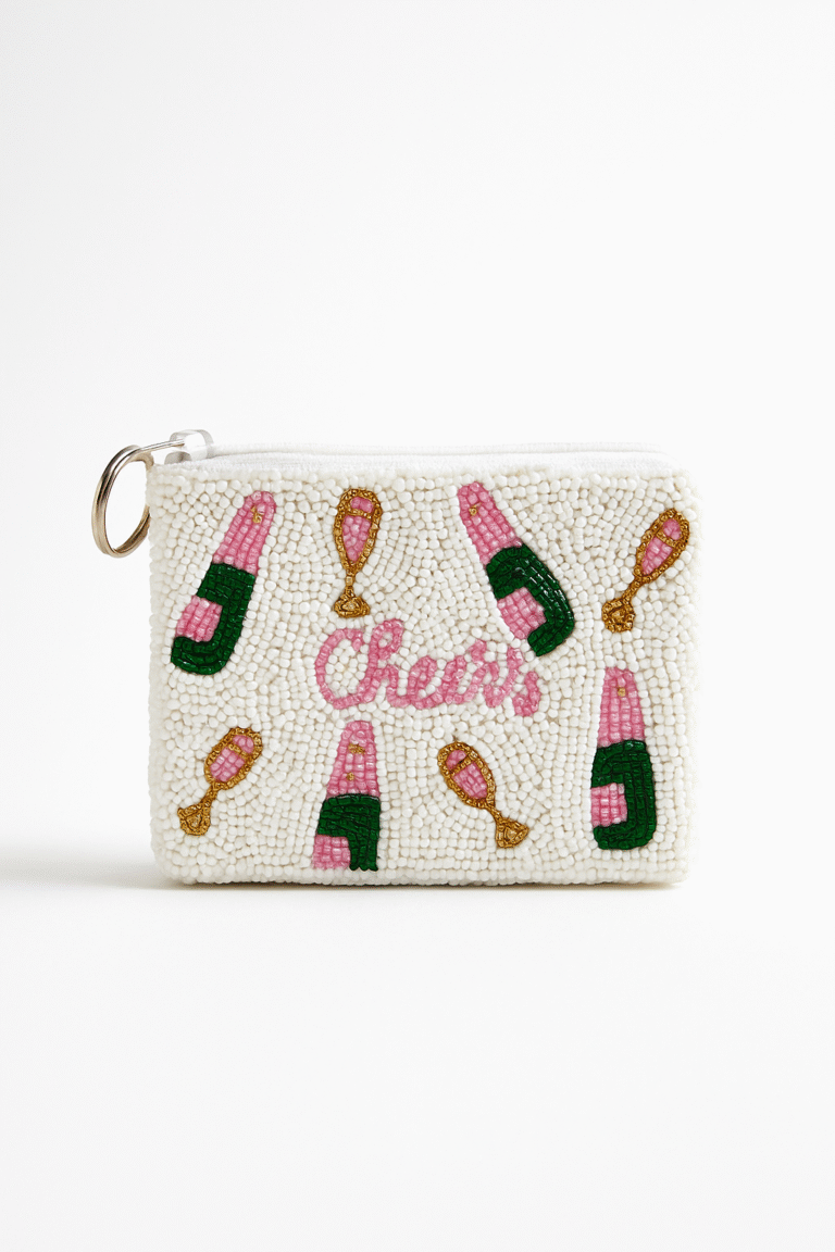 White beaded coin purse with pink champagne bottle and glass design and ‘Cheers’ beaded text, size 4×5 inches