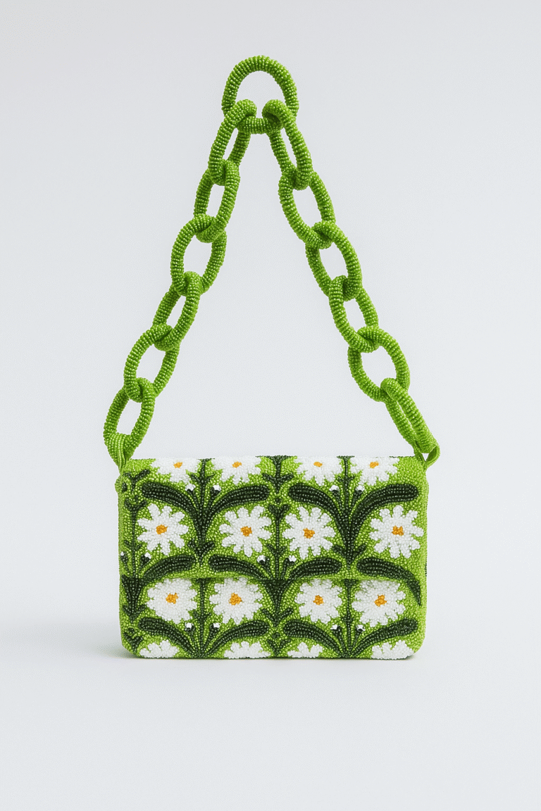 Green hand-beaded clutch decorated with white daisy flowers and a chunky beaded chain strap